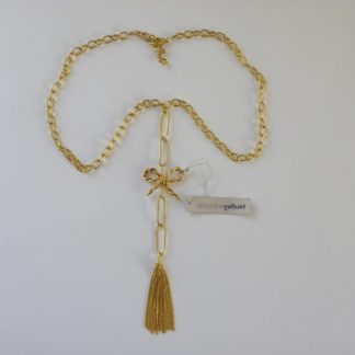 collier de créatrice en vermeil, montée d'un noeud papillon et d'un pompon, le collier est entièrement fait main et d'artisanat Français