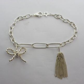Bracelet noeud et pompon en argent massif 925 de la créatrice Géraldine Valluet joaillerie Paris