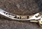 Voici la photo du poinçon représentant une bague Carier Paris en platine de titrage 950
