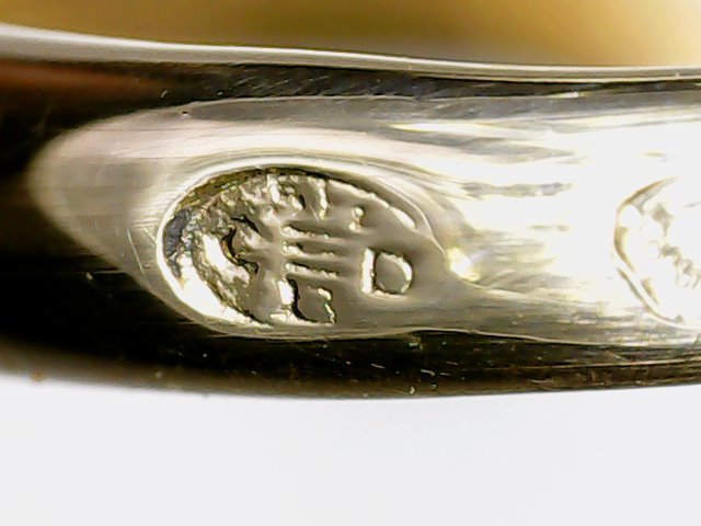 Poinçon ovale de fabricant d’exportation pour la Ste société C symbole D